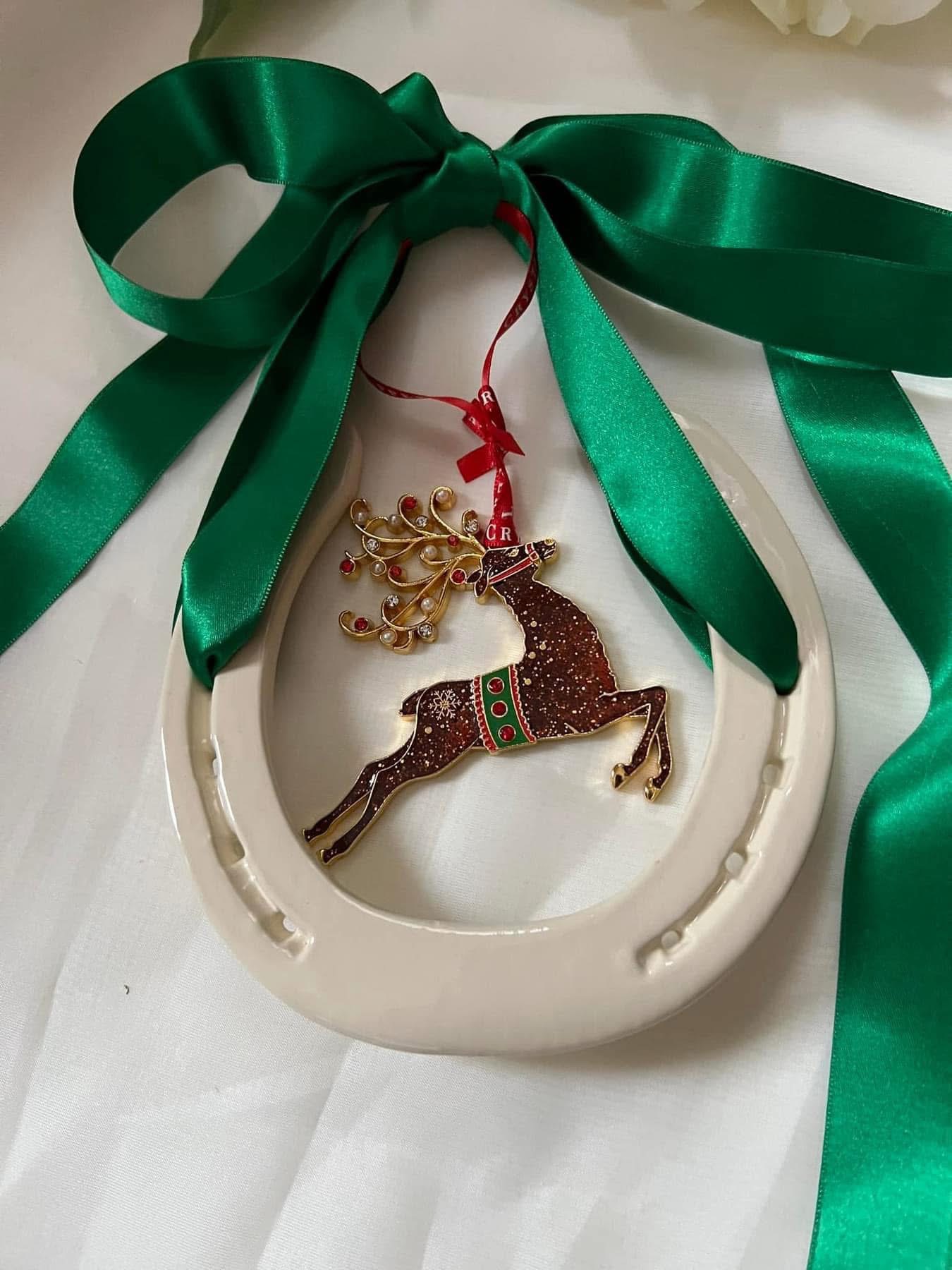 Reindeer and good luck horse shoe